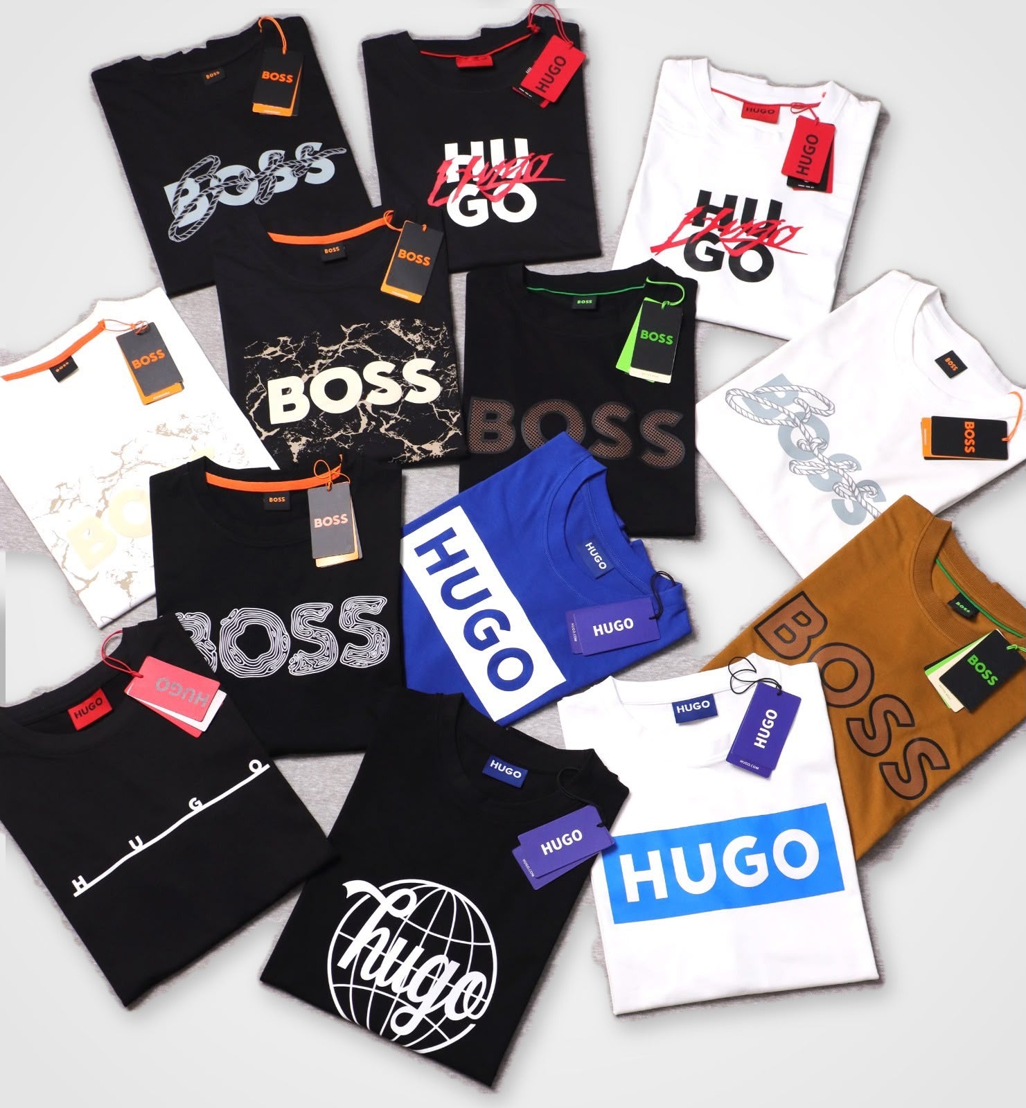 Más playeras Hugo y Boss de distintos modelos y colores, acomodadas juntas